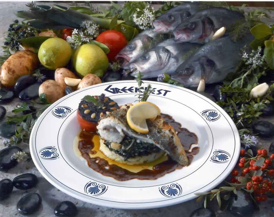 Lavraki: striped bass served on a bed of potato puree surrounded by a reduced red-wine sauce